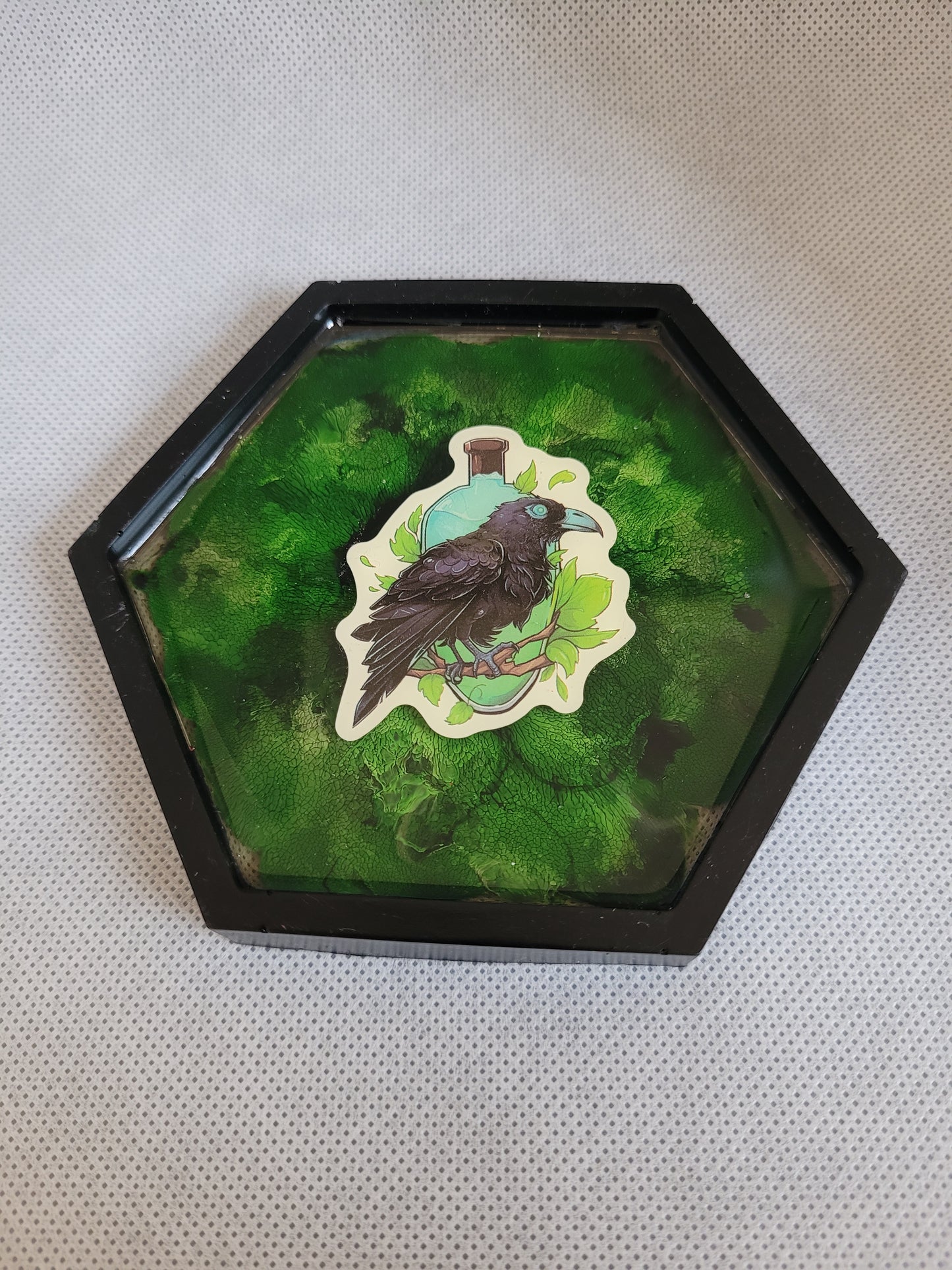 Raven potion bottle green and black hexagon resin coaster