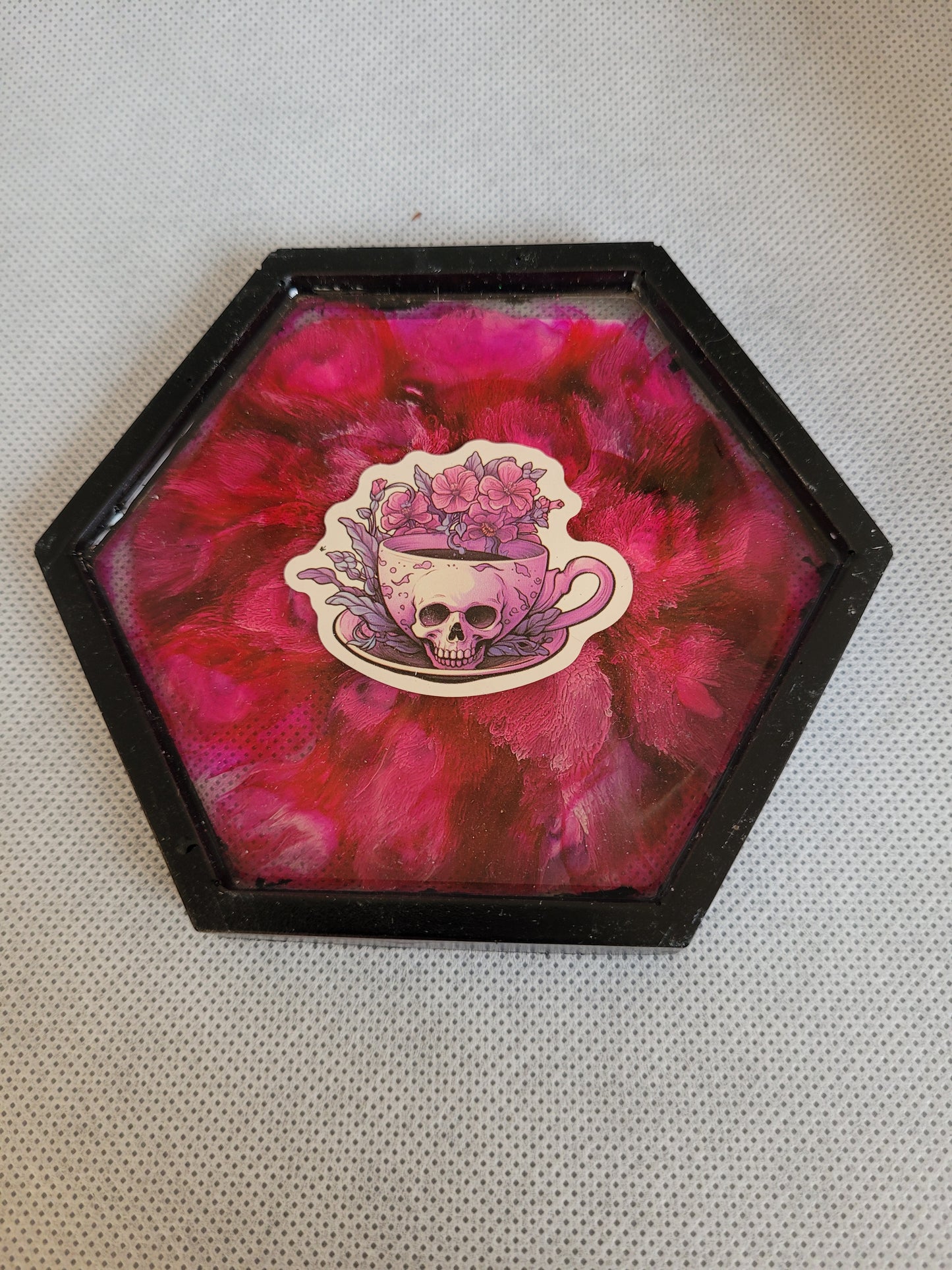 Pink and black skull teacup hexagon resin coaster