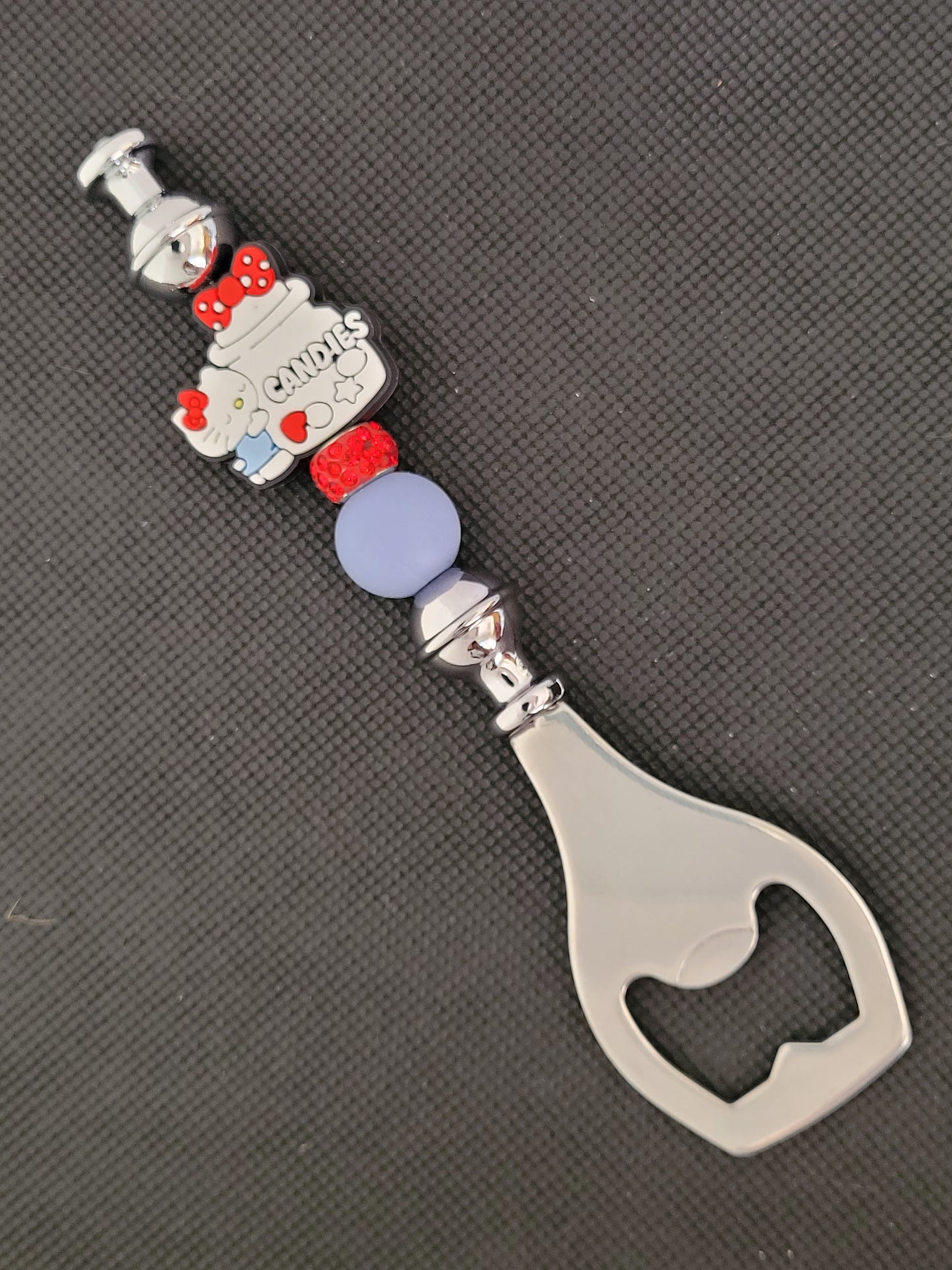 Hello kitty cookie jar beaded bottle opener