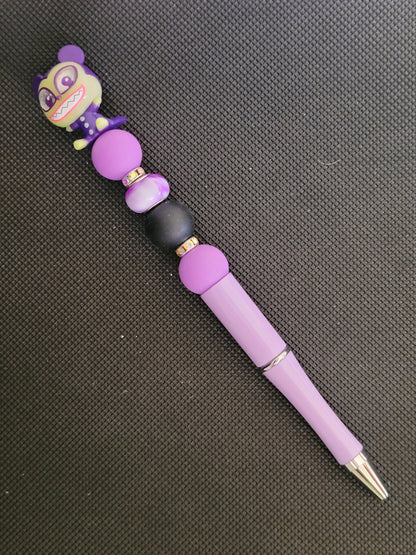 Doorables glow in the dark vampire toy (nbc) beaded writing pen